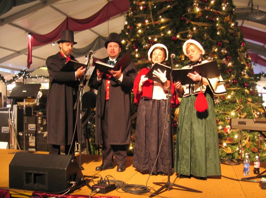 Our first gig! Olde Towne Carolers perform onstage at Christkindlmarkt in 2005. We returned many times afterwards!