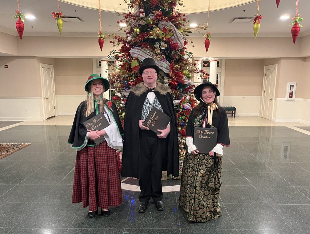 The carolers perform at a country club event in Pittsburgh.
