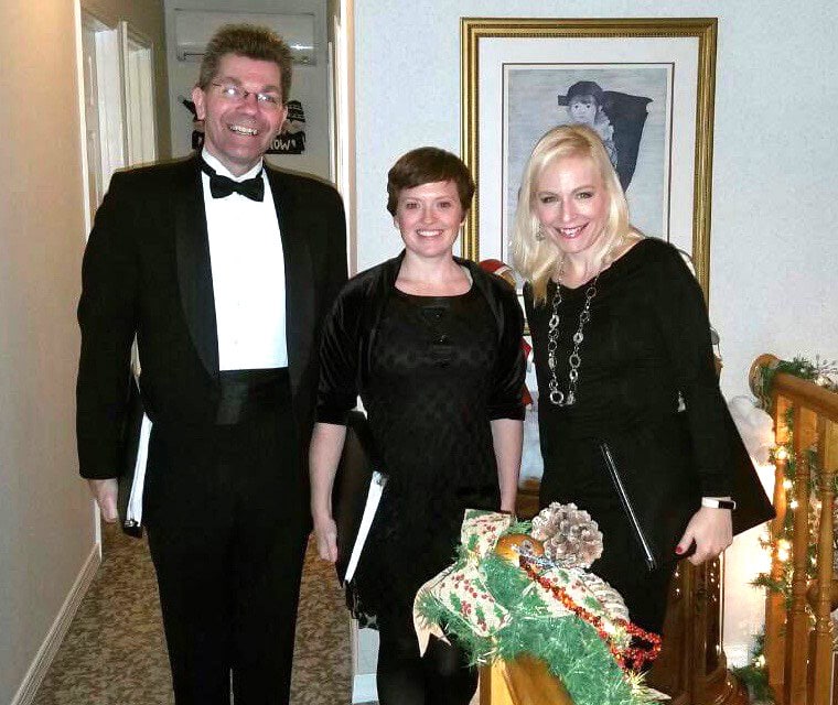 Chris, Elizabeth, and Jennifer pose during a special annual performance at a Christmas party in the Effort, PA.