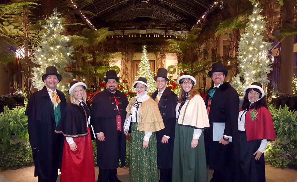 A special octet of our carolers performs at Longwood Gardens in 2015.