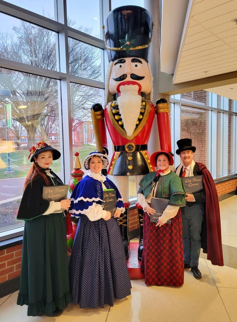 Logan, Sara, Meghan, and Gregory carol for a performance of "The Nutcracker" by the Pennsylvania Ballet Academy in York, PA.